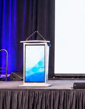 Close view of the podium with its audience-facing LED display